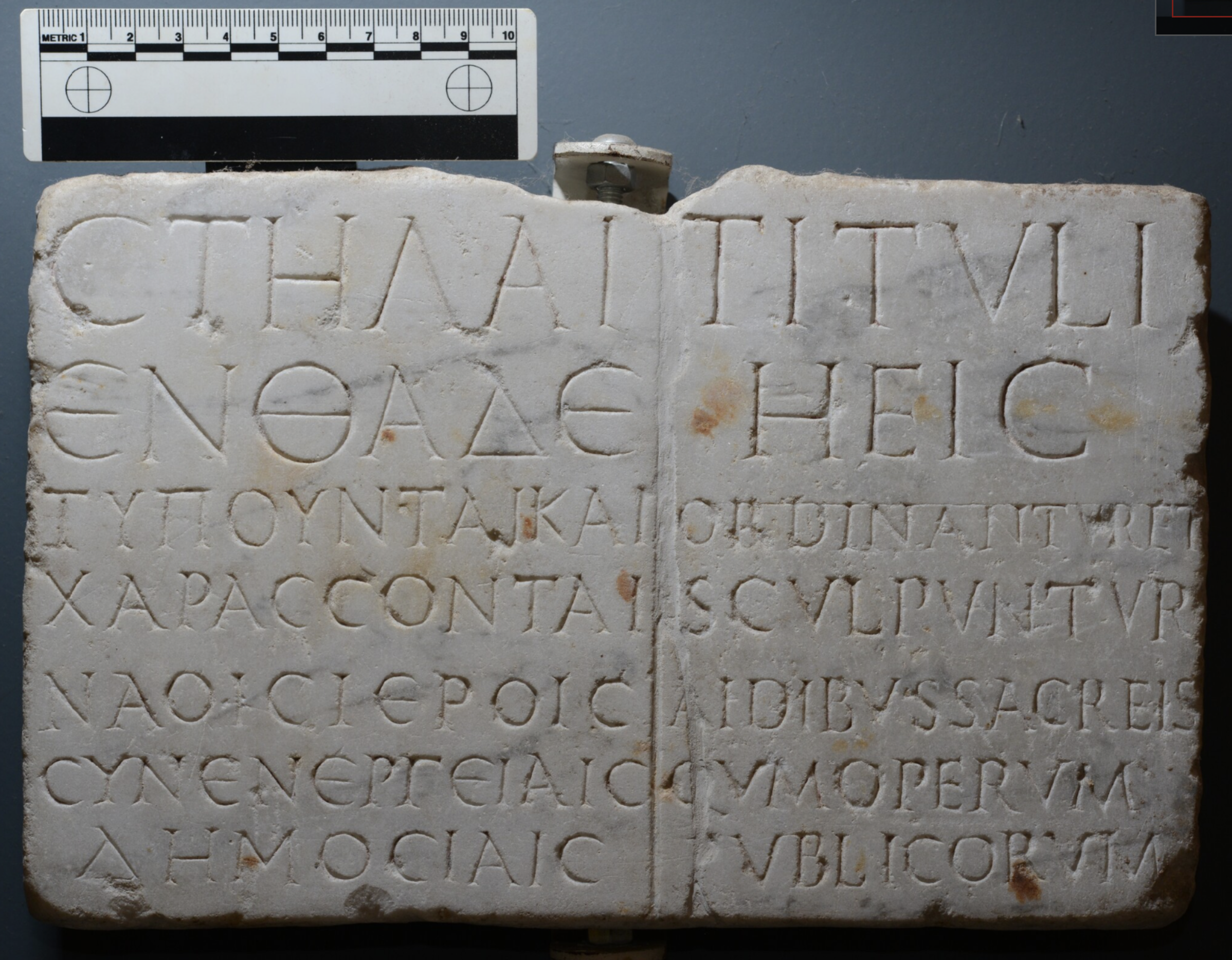 CIL X 7296 / IG XIV 297 — bilingual stonecutter's plaque from Palermo, the case object